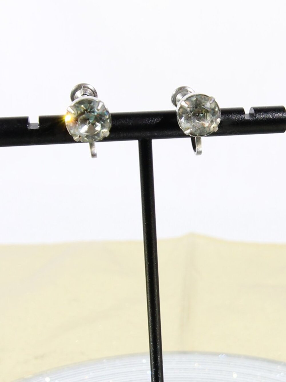 vintage Little Nemo screw-back earrings feat a classic clear solitaire crystals